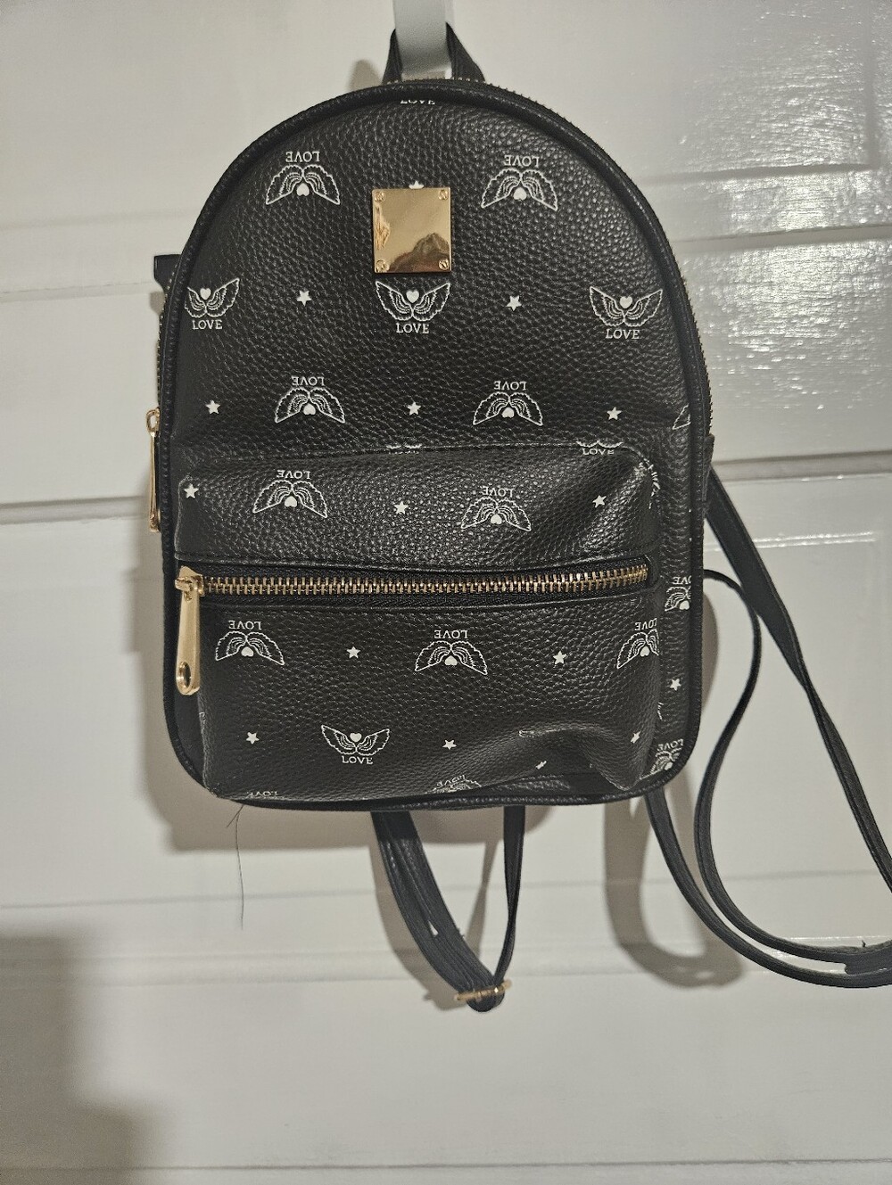Claire's Black Mini Backpack with White 'LOVE' Motif and Gold Hardware